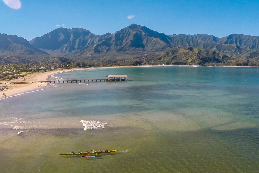 Hanalei Bay's clear waters and beautiful coral reefs provide a stunning backdrop for a day of fishing